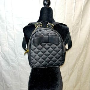 Mini Betsey Johnson, faux leather black knapsack with gold accents